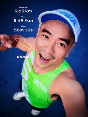 Thuận trong áo chạy xanh lá